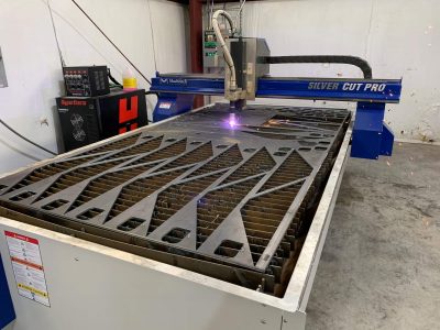 A CNC plasma table cutting intricate shapes