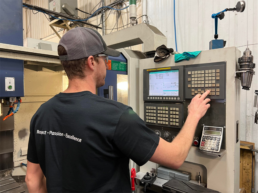 Operator inputting into CNC controls